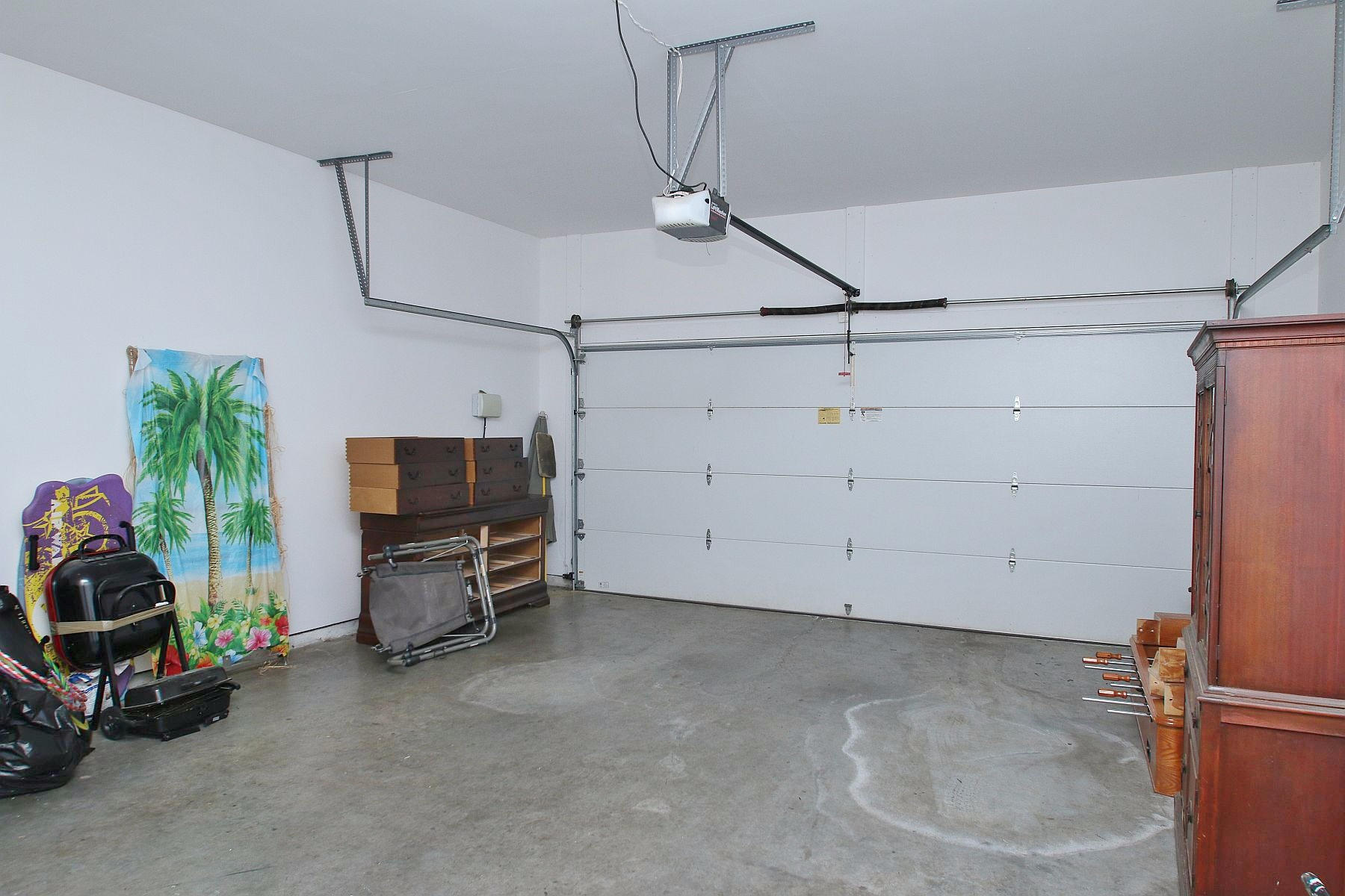 10 Old Point Road Moneta, VA 24121 - Photo 28 of 79 a view of a garage with furniture and a flat screen tv