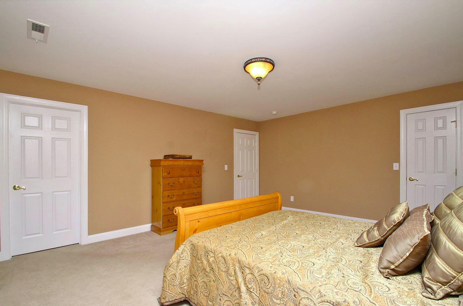 10 Old Point Road Moneta, VA 24121 - Photo 38 of 79 a bedroom with a bed and ceiling fan