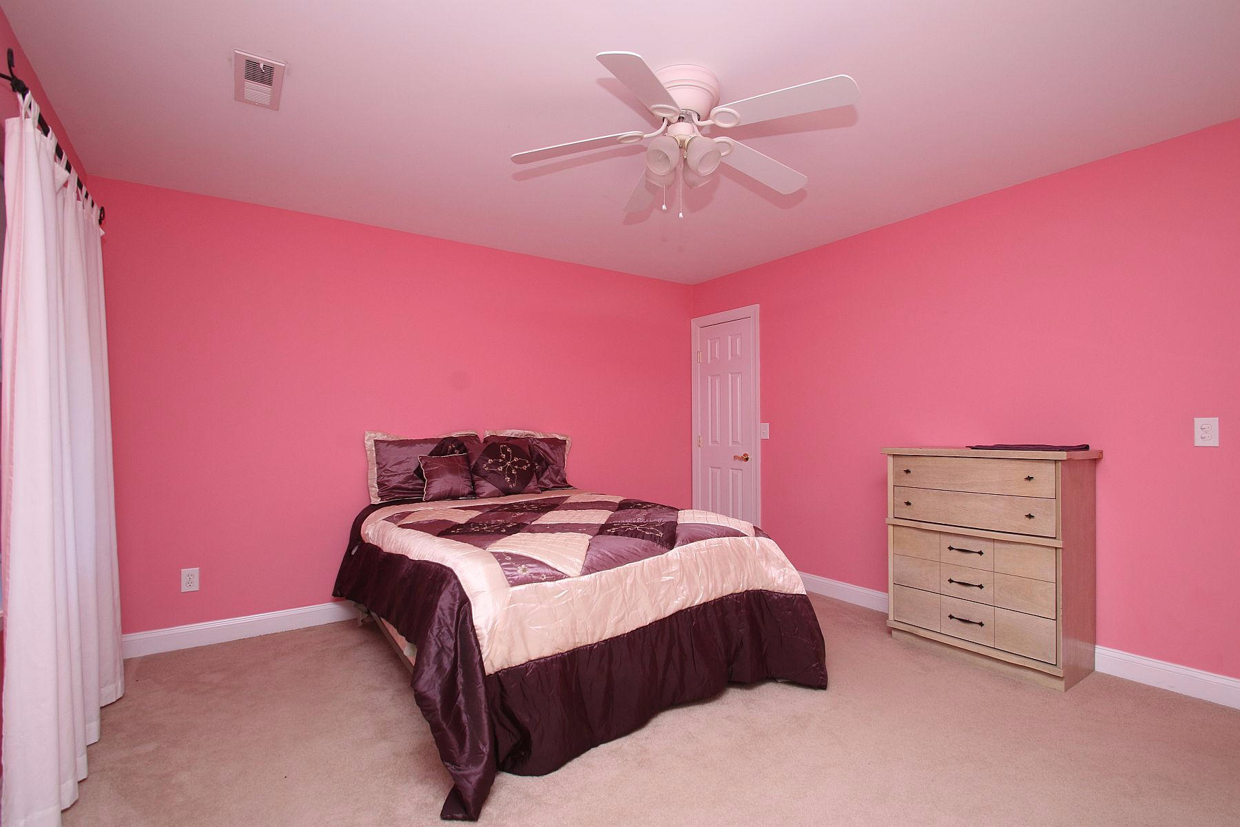 10 Old Point Road Moneta, VA 24121 - Photo 51 of 79 a bedroom with a bed and a chandelier