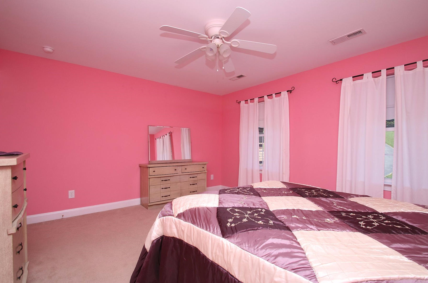 10 Old Point Road Moneta, VA 24121 - Photo 52 of 79 a bedroom with a bed dresser and a chandelier