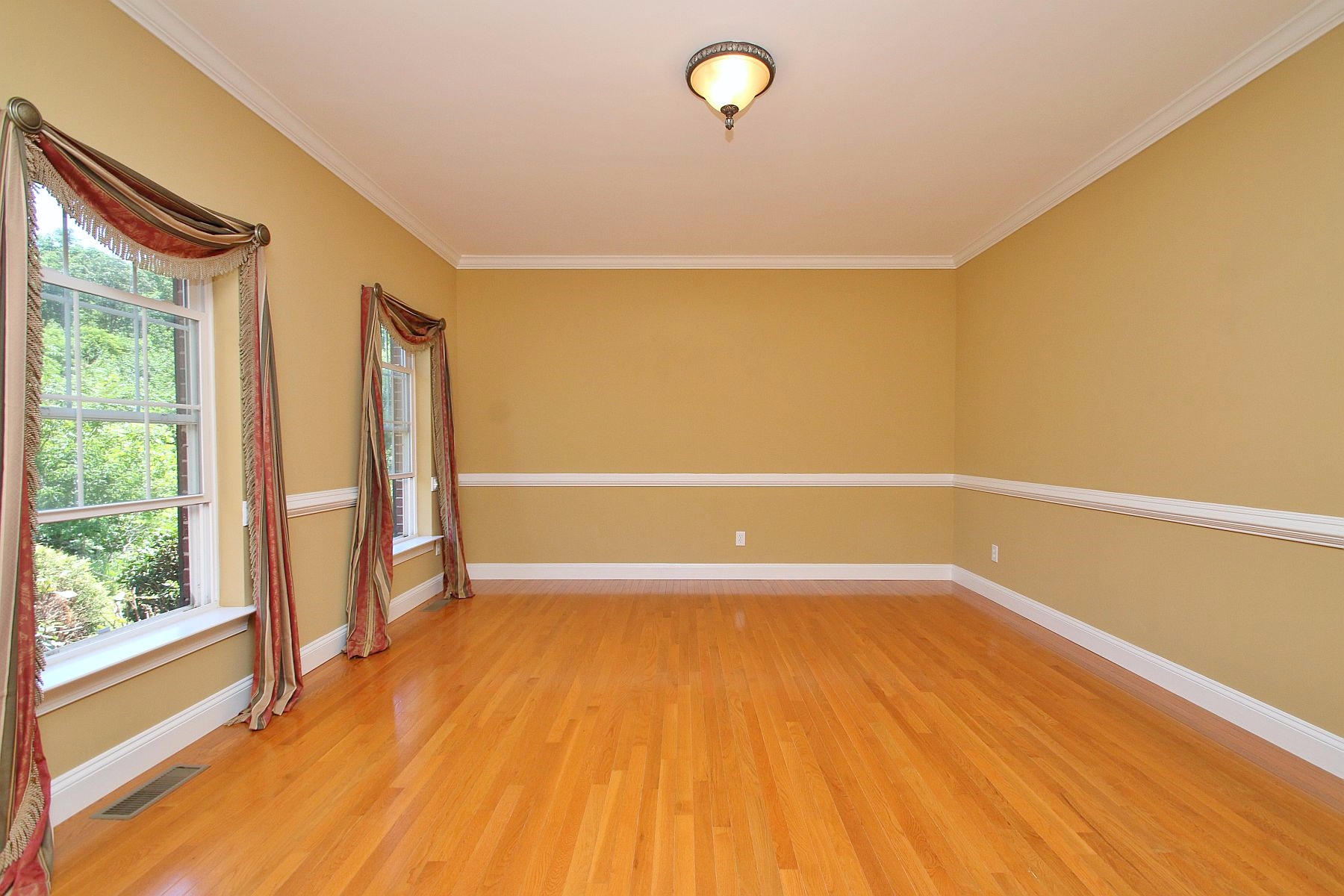 10 Old Point Road Moneta, VA 24121 - Photo 7 of 79 a view of an empty room with a window and wooden floor