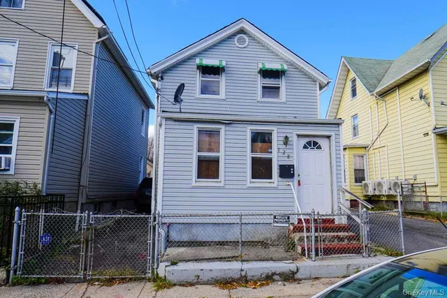 a front view of a house with balcony