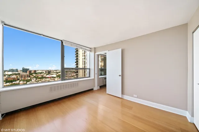 a view of an empty room with a window