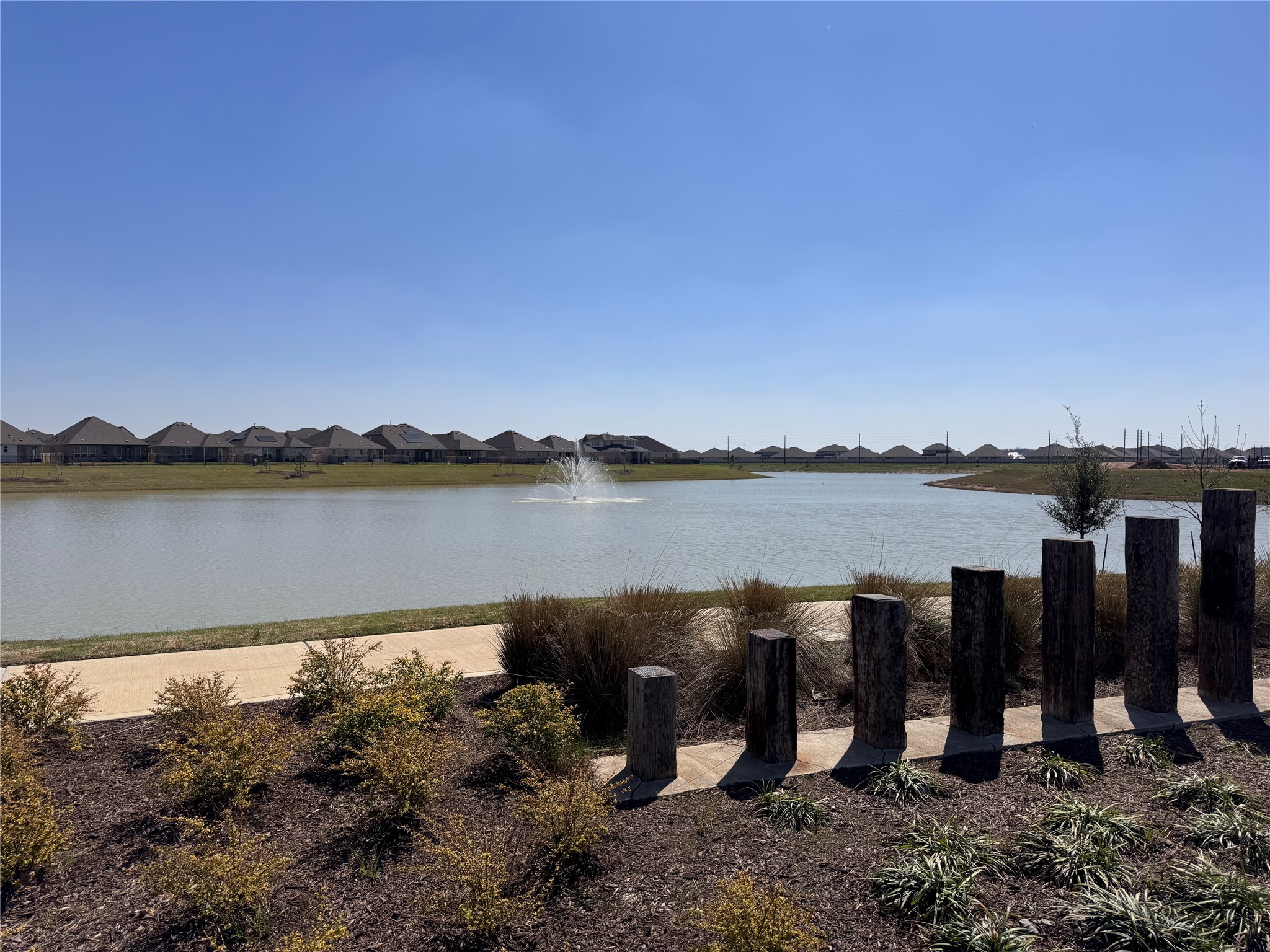 6150 Cherry Ripe Lane Katy, TX 77493 - Photo 16 of 19 a view of a lake with houses in the back