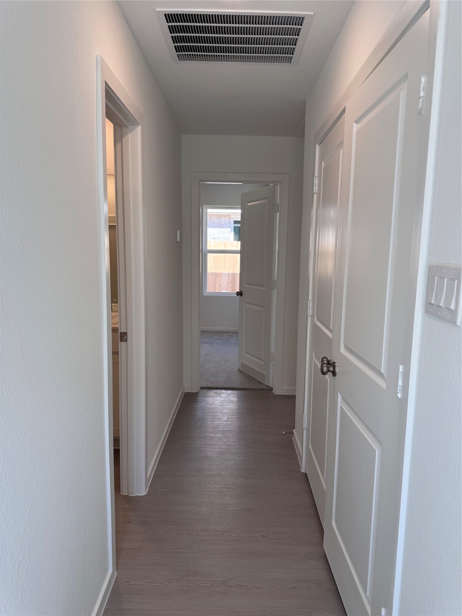 6150 Cherry Ripe Lane Katy, TX 77493 - Photo 4 of 19 a view of a hallway with wooden floor and closet