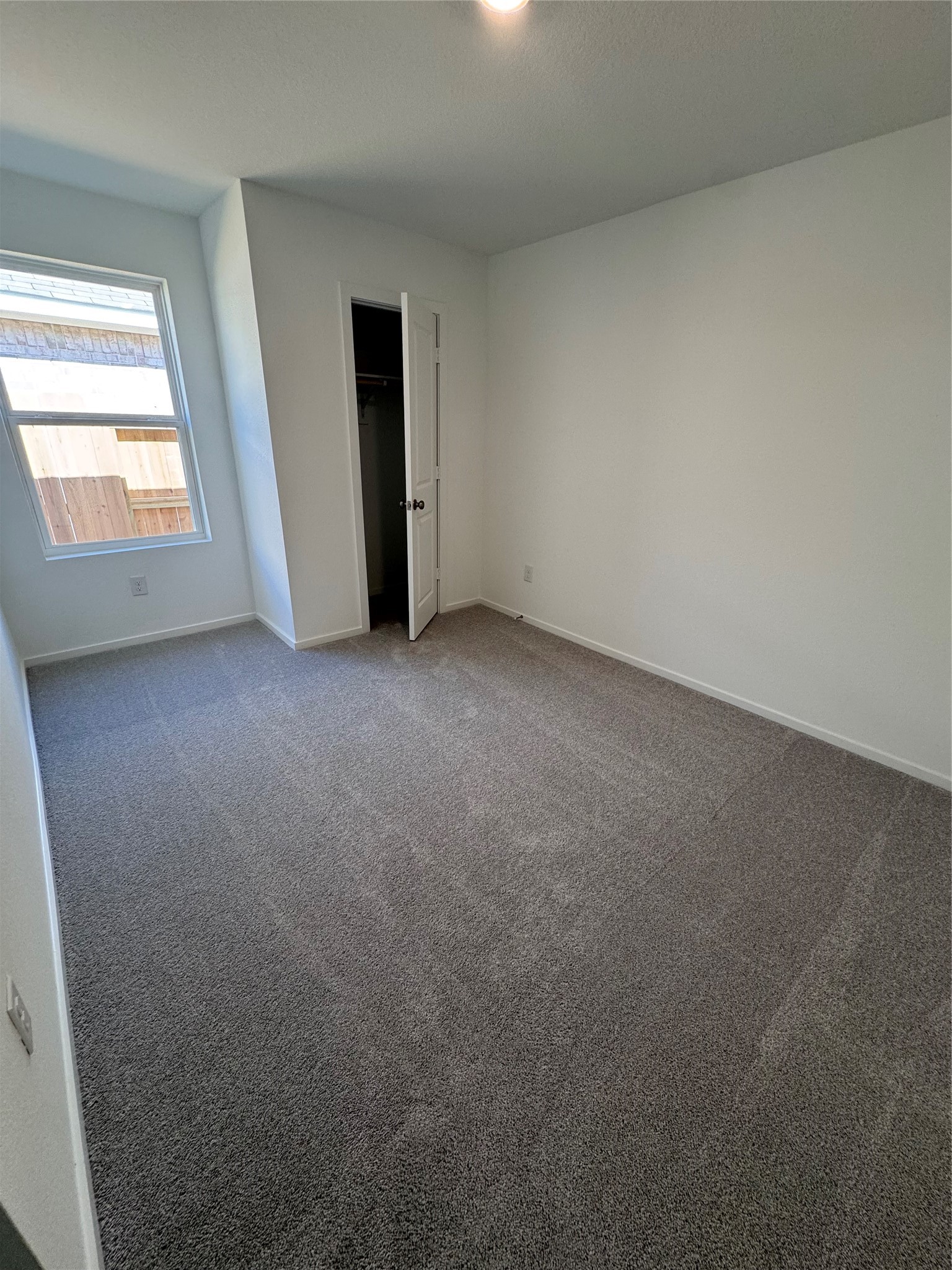 6150 Cherry Ripe Lane Katy, TX 77493 - Photo 8 of 19 an empty room with window