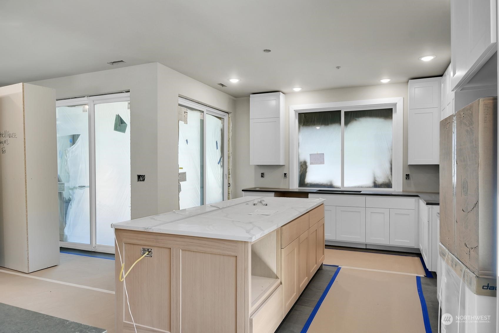 3123 234th Street Southeast Bothell, WA 98021 - Photo 12 of 26 a kitchen with a sink stove and refrigerator
