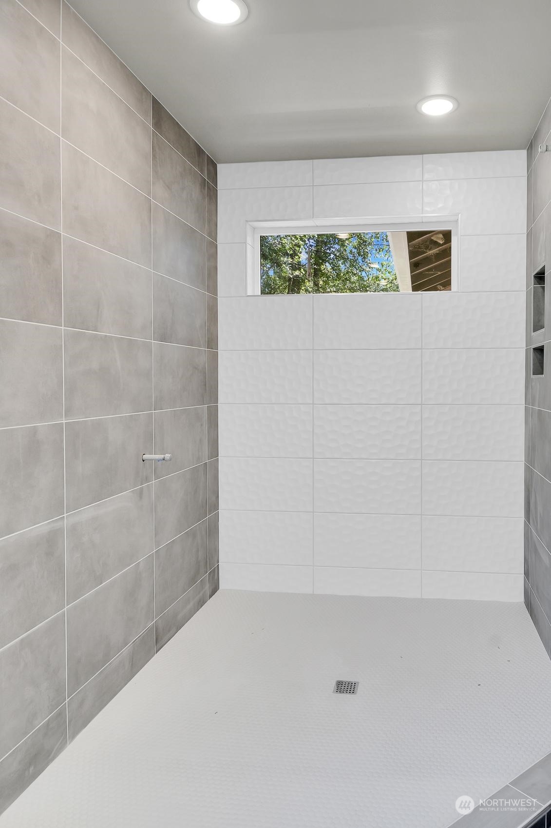 3123 234th Street Southeast Bothell, WA 98021 - Photo 18 of 26 a bathroom with a shower