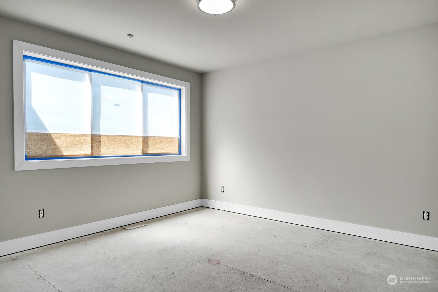 3123 234th Street Southeast Bothell, WA 98021 - Photo 21 of 26 an empty room with a window