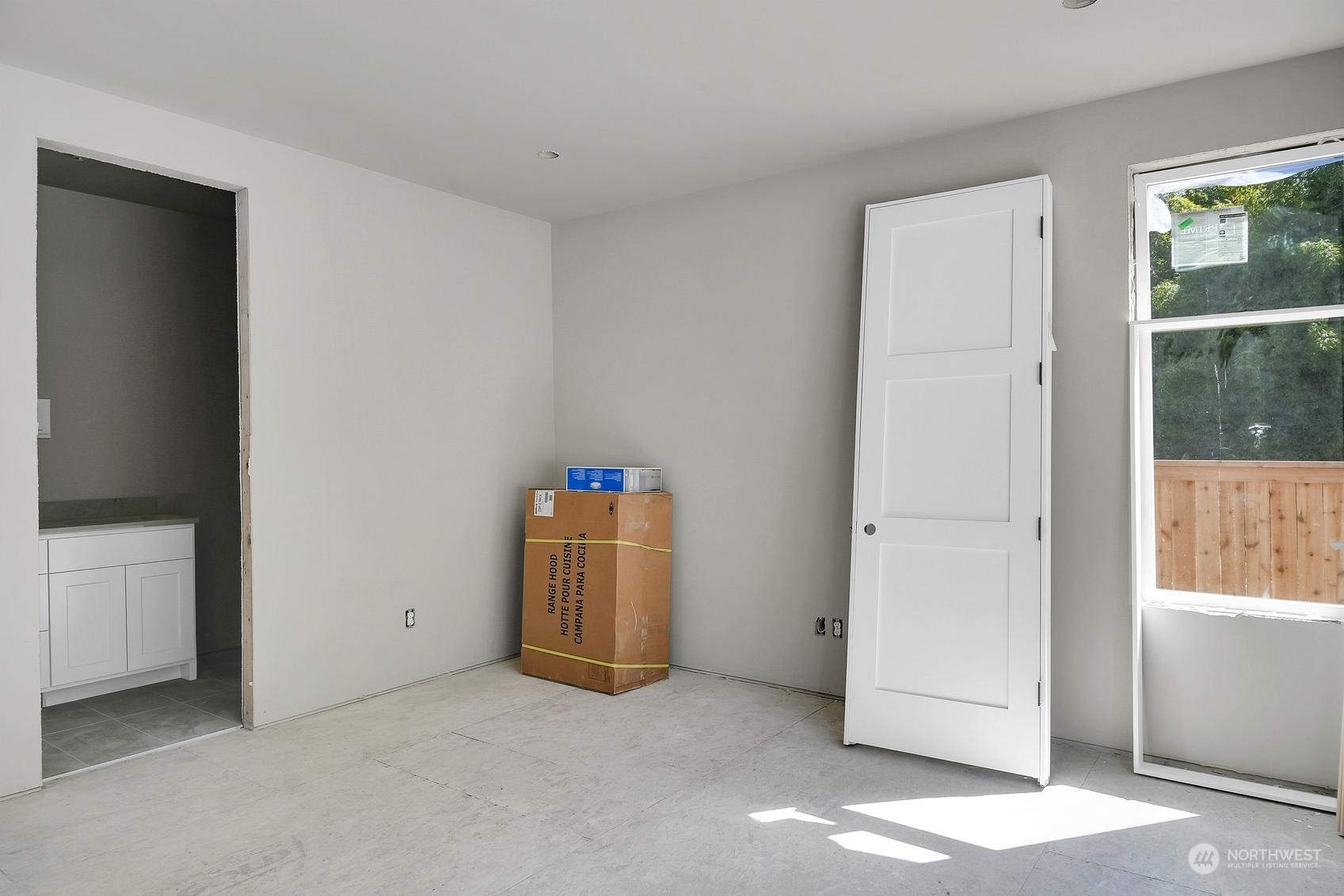 3123 234th Street Southeast Bothell, WA 98021 - Photo 10 of 26 an empty room with windows
