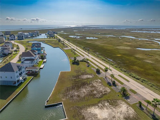 a view of a swimming pool with seating area