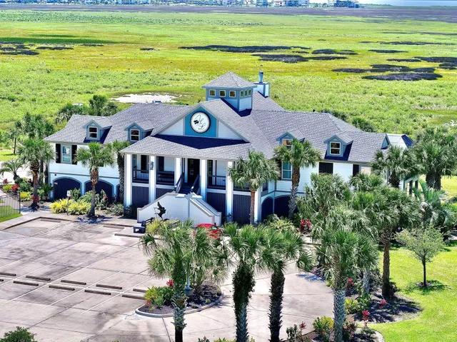 a view of a house with a ocean view