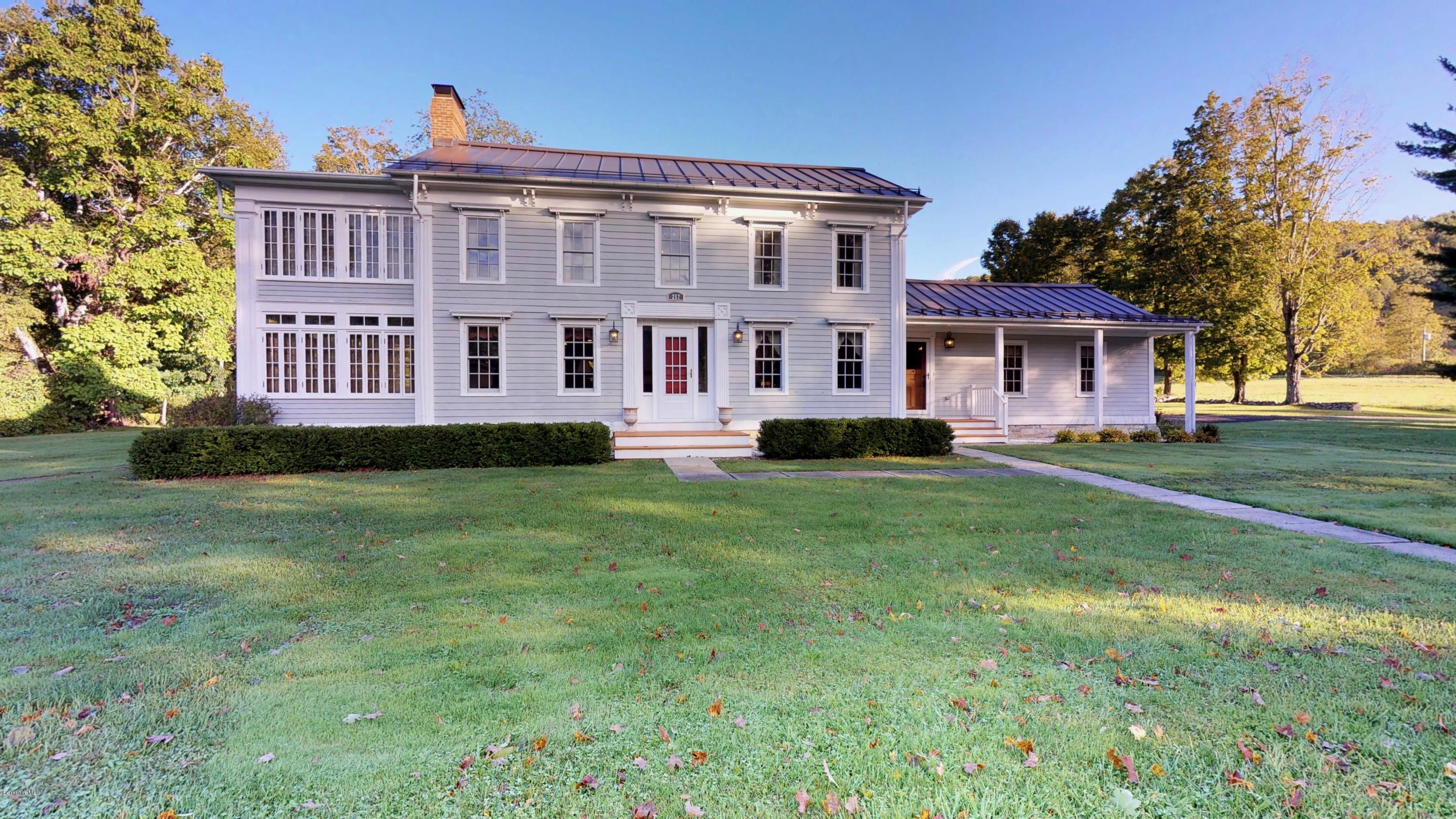 257 North Main Street Hancock, MA 01237 - Photo 1 of 1 a large house with a yard