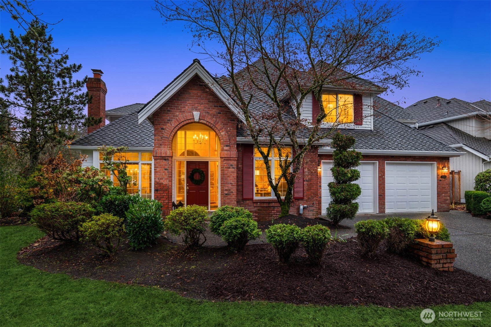 a house view with a garden space