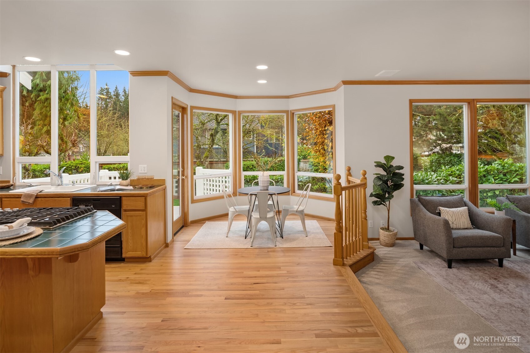 3014 213th Street Southeast Bothell, WA 98021 - Photo 12 of 33 a living room with furniture and a large window