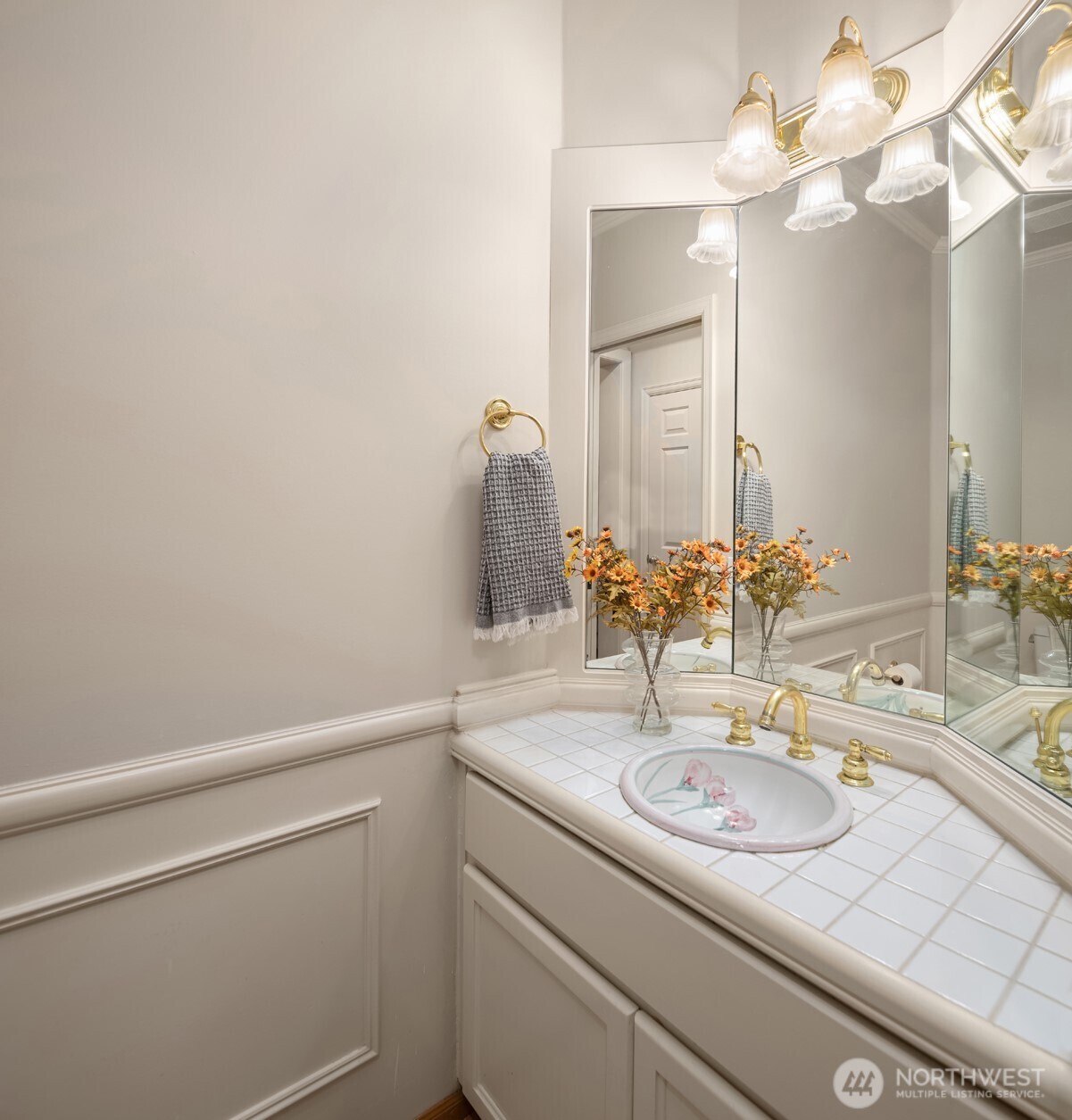 3014 213th Street Southeast Bothell, WA 98021 - Photo 16 of 33 a bathroom with a sink and a mirror