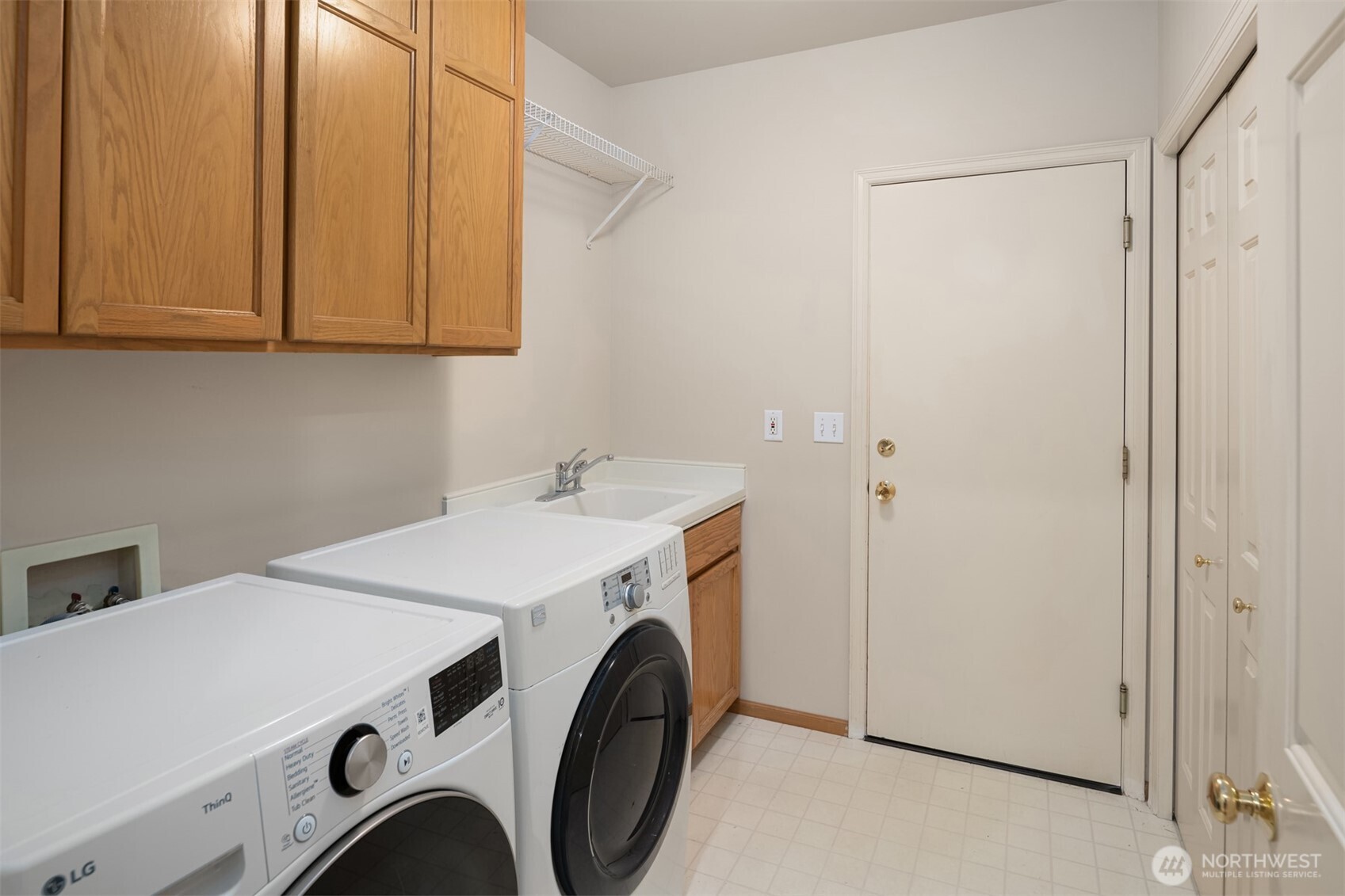 3014 213th Street Southeast Bothell, WA 98021 - Photo 17 of 33 a utility room with dryer and washer