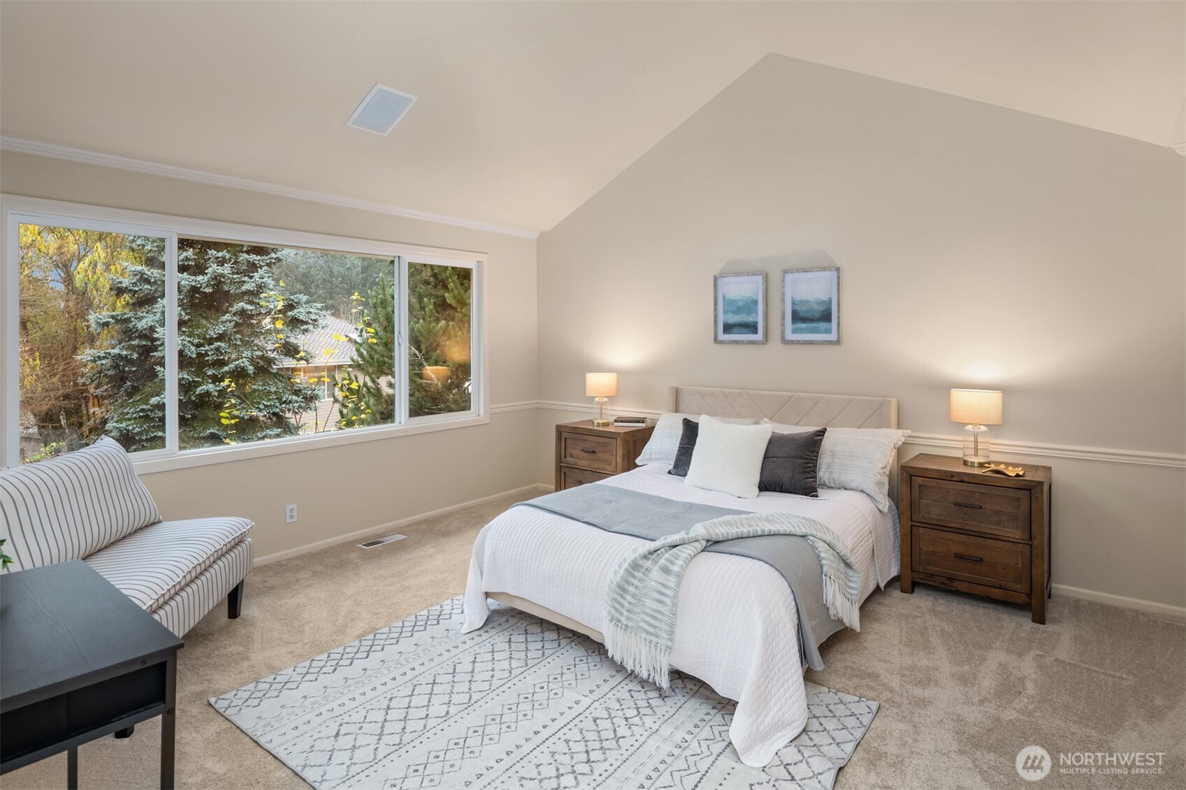 3014 213th Street Southeast Bothell, WA 98021 - Photo 18 of 33 a bedroom with a large bed and a couch