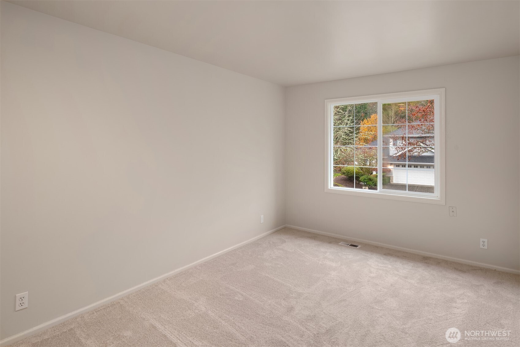 3014 213th Street Southeast Bothell, WA 98021 - Photo 24 of 33 an empty room with windows