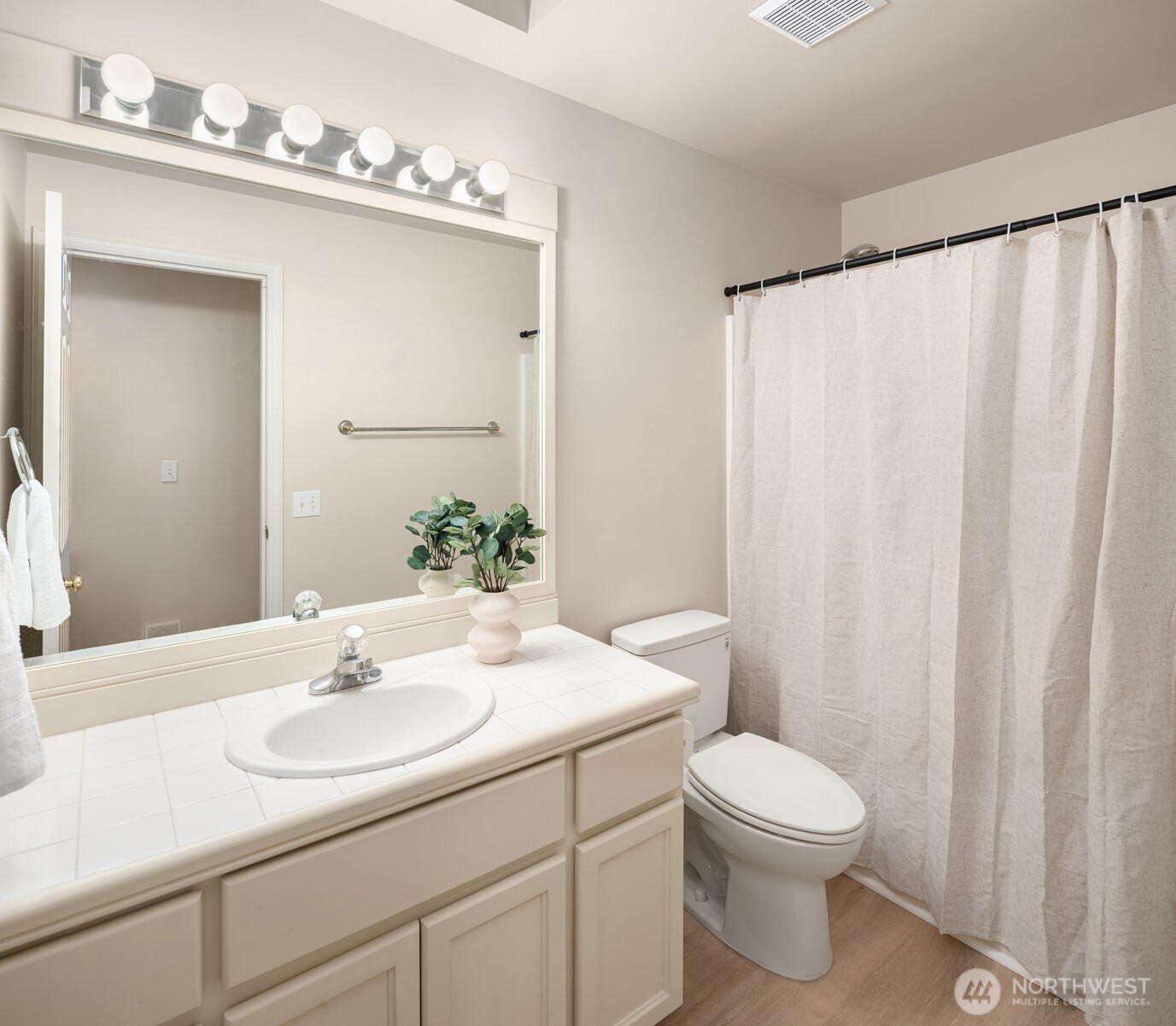 3014 213th Street Southeast Bothell, WA 98021 - Photo 26 of 33 a bathroom with a sink and a mirror