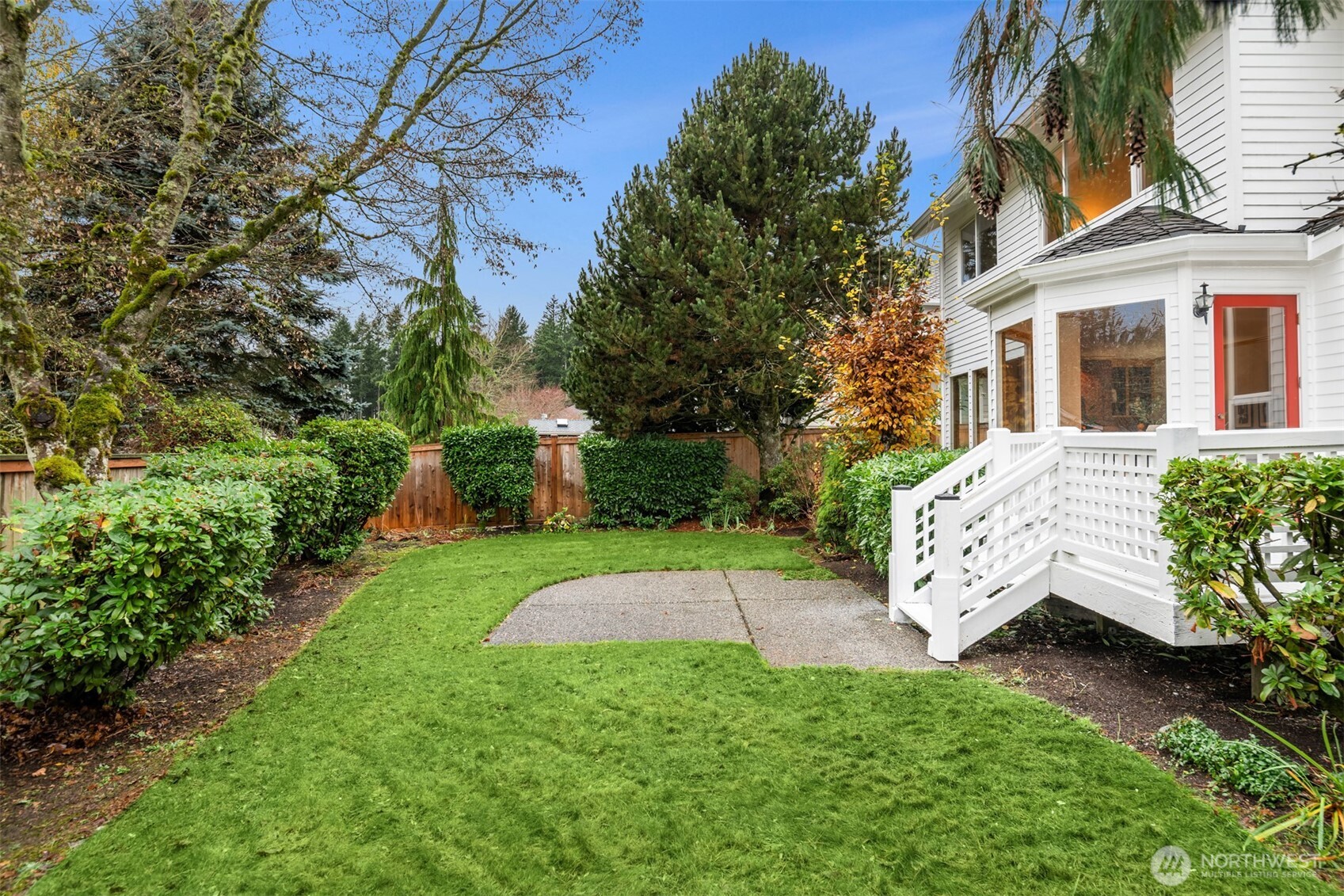 3014 213th Street Southeast Bothell, WA 98021 - Photo 28 of 33 a view of a house with backyard and sitting area