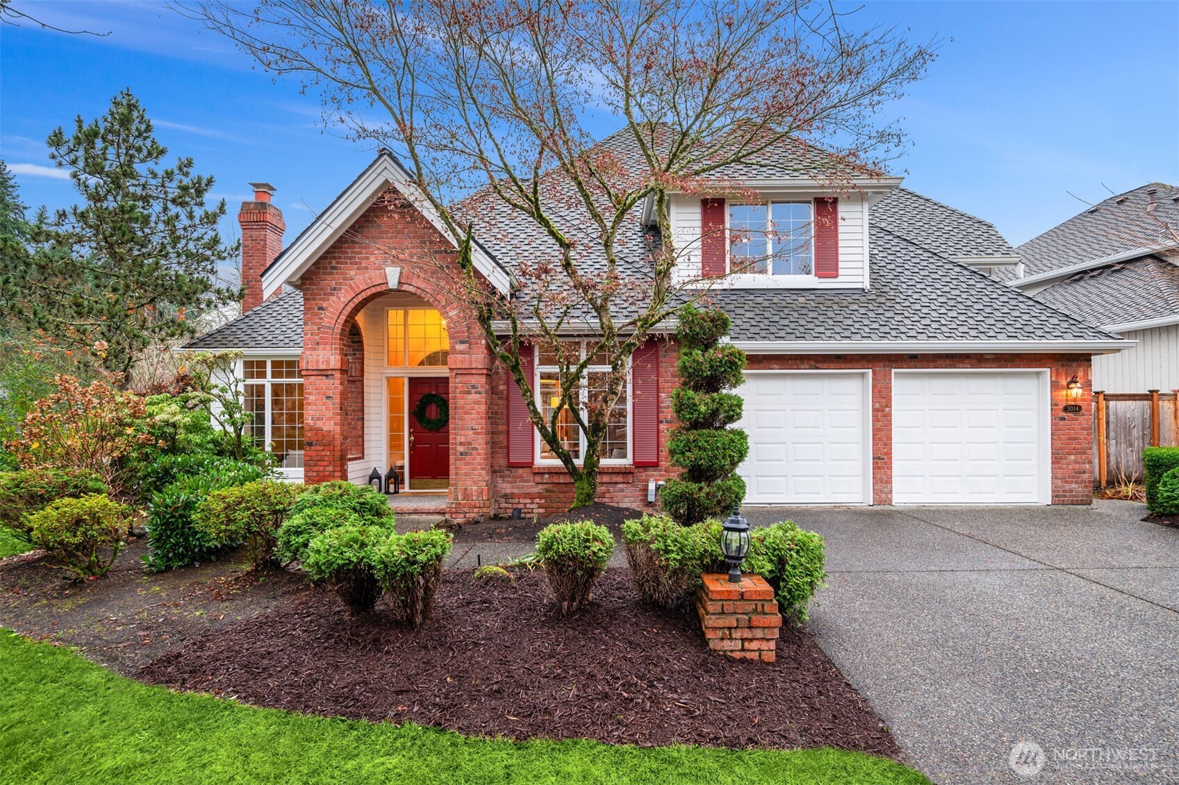 3014 213th Street Southeast Bothell, WA 98021 - Photo 31 of 33 a front view of a house with a yard