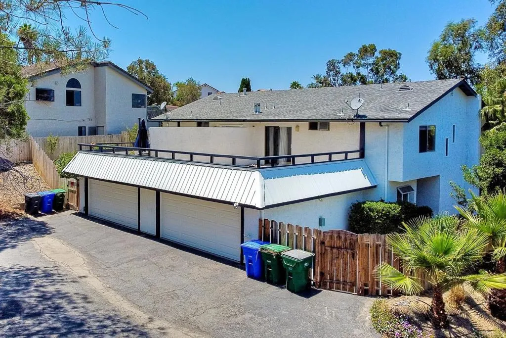 2425 Torrejon Place Carlsbad, CA 92009 - Photo 1 of 61 a front view of a house with garden