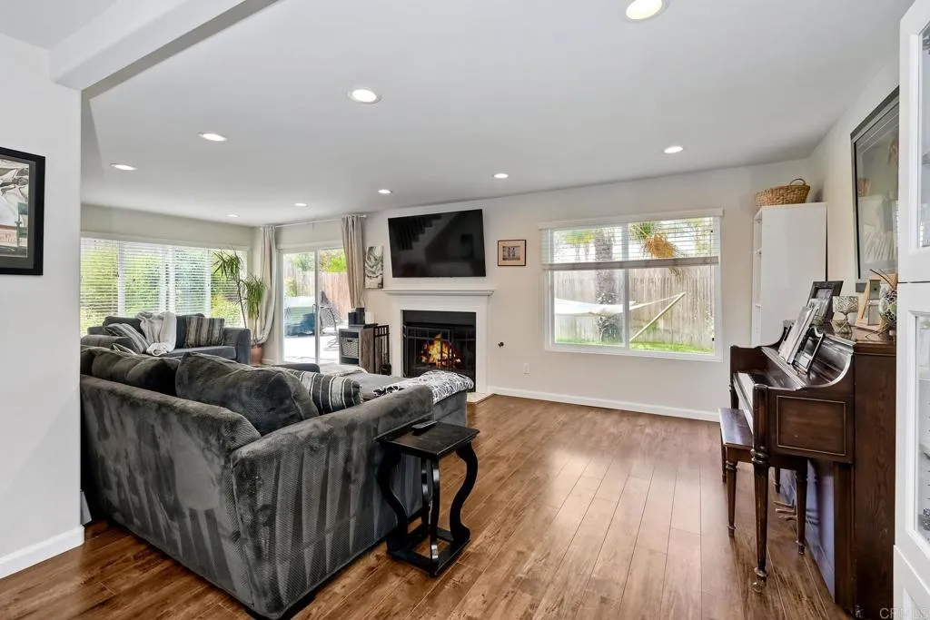 2425 Torrejon Place Carlsbad, CA 92009 - Photo 25 of 61 a living room with furniture and a flat screen tv