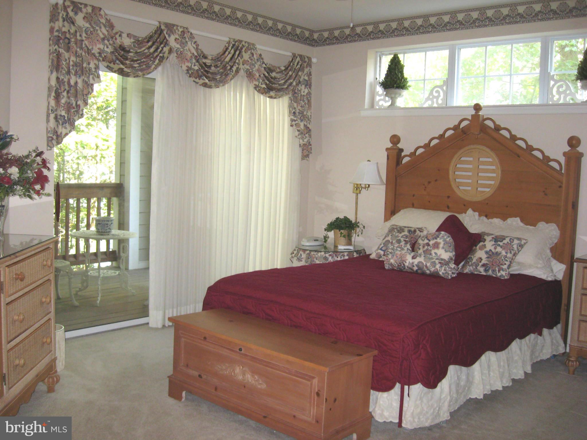 802 Runabout Loop Solomons, MD 20688 - Photo 10 of 28 Bedroom (Master) w/walkout to private deck
