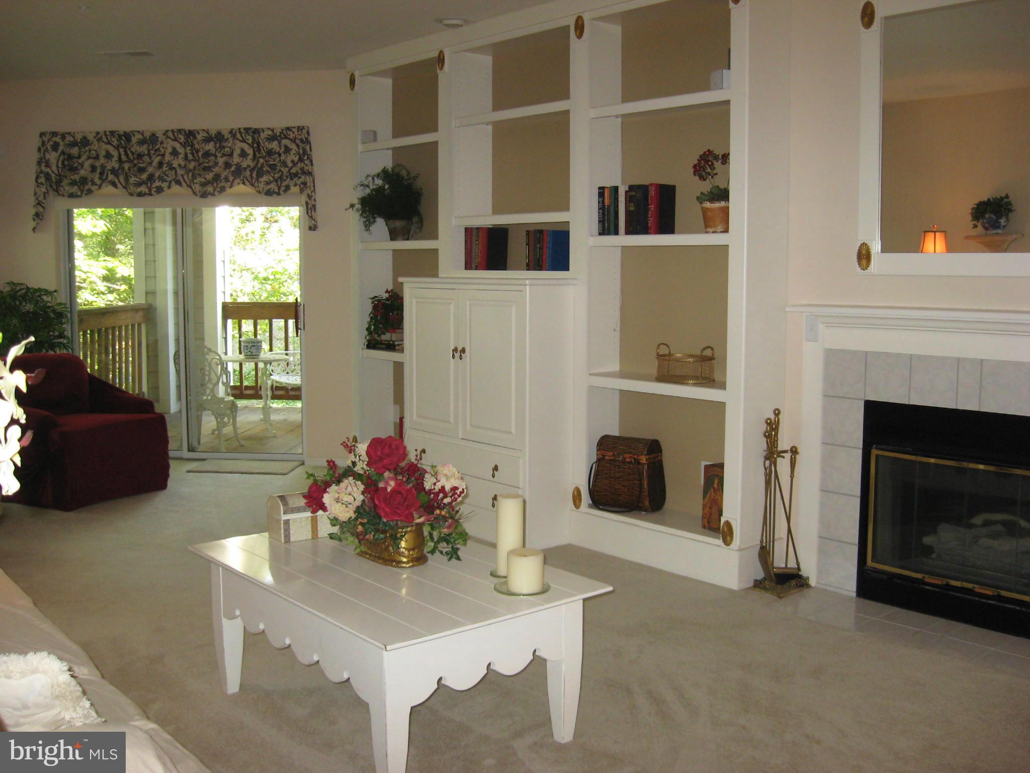 802 Runabout Loop Solomons, MD 20688 - Photo 3 of 28 2BR/2BA Waterfront Condo- LR w/gas FP & Built-ins
