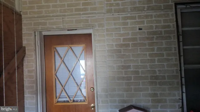 a bathroom with a shower and a sink