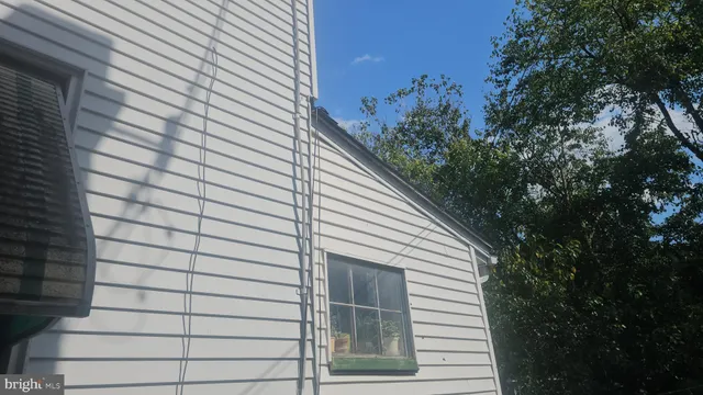 a view of a house with a street