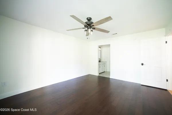 a bathroom with a double vanity sink and mirror