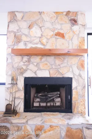 a view of a hallway with windows