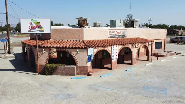 a view of livingroom with fireplace and furniture