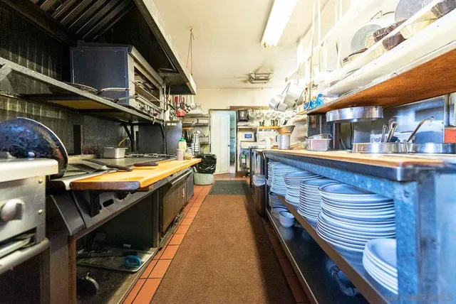 a swimming pool with outdoor seating