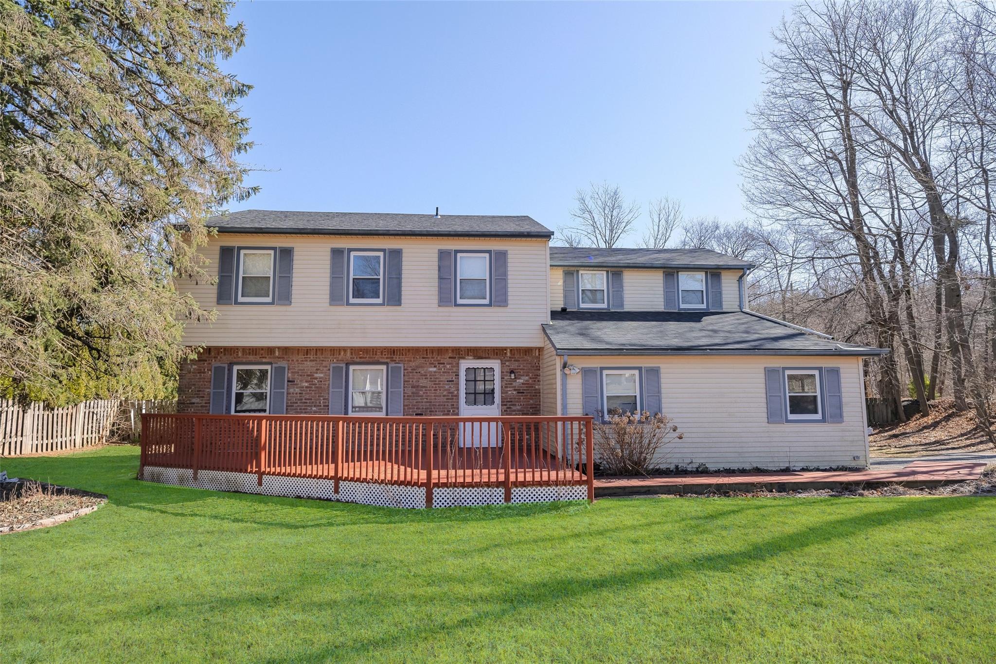 10 Pershing Avenue Locust Valley, NY 11560 - Photo 1 of 1 a view of a house with a backyard