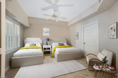 a bedroom with bed and window