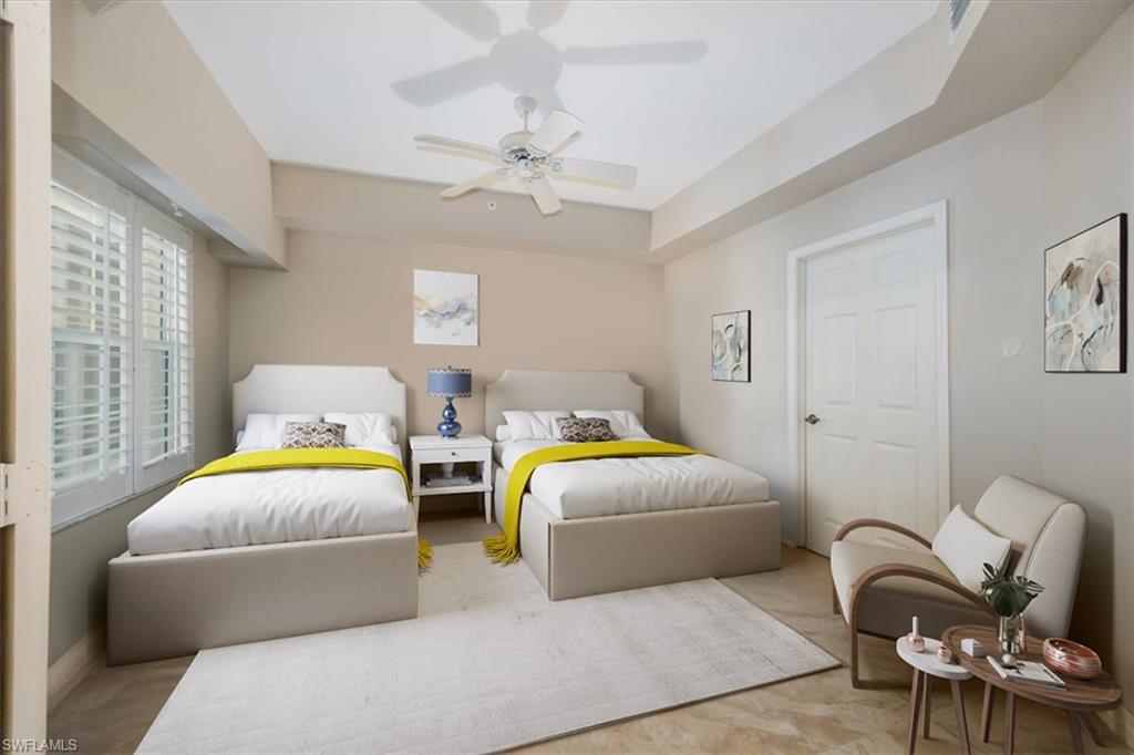 451 Bayfront Place, Unit 5207 Naples, FL 34102 - Photo 20 of 35 a bedroom with bed and window
