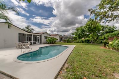 22622 Southwest 65th Avenue Boca Raton, FL 33428 - Photo 33 of 39 poolside...