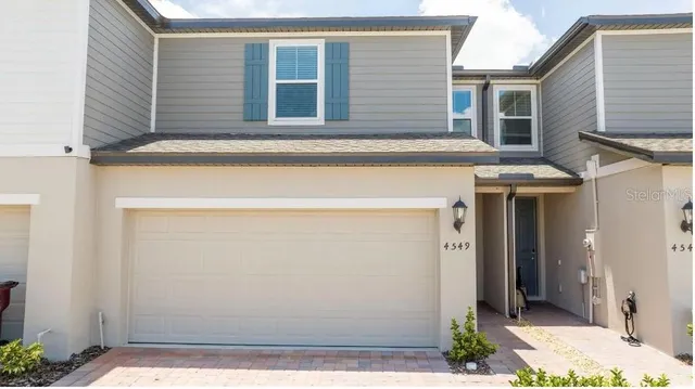 a view of a house with garage