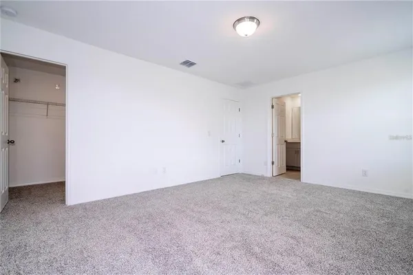 an empty room with an entryway