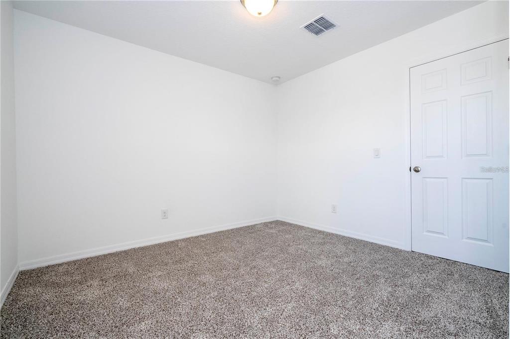 4549 Burrowing Owl Loop St. Cloud, FL 34772 - Photo 40 of 48 a view of an empty room