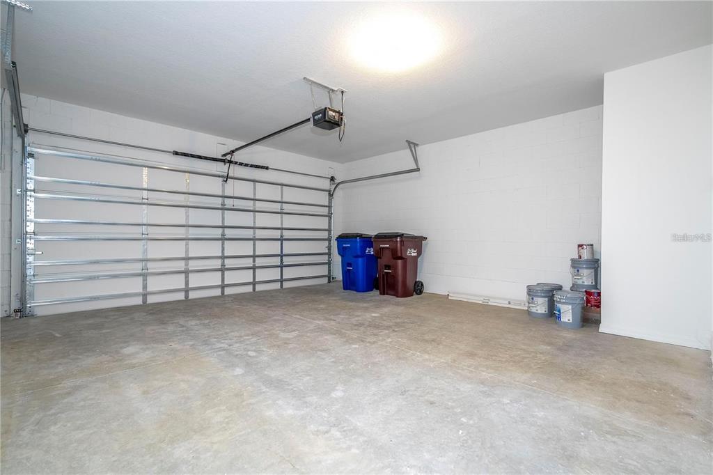 4549 Burrowing Owl Loop St. Cloud, FL 34772 - Photo 48 of 48 a view of a room with storage and racks