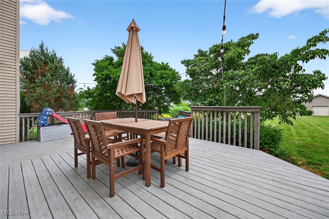 35748 Mills Road Avon, OH 44011 - Photo 32 of 44 Wooden terrace with outdoor dining area