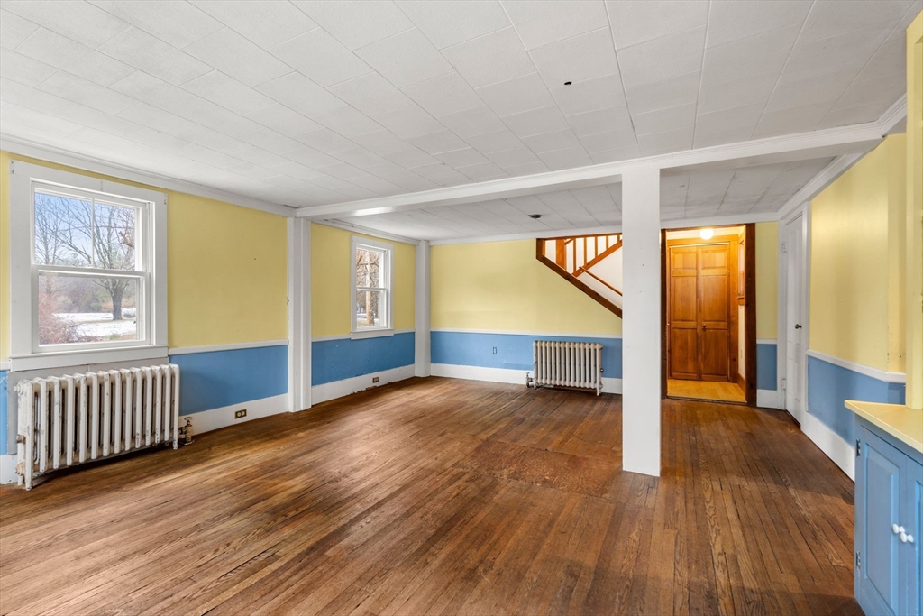 104 Mill Street Groton, MA 01450 - Photo 16 of 30 a view of an entryway with wooden floor