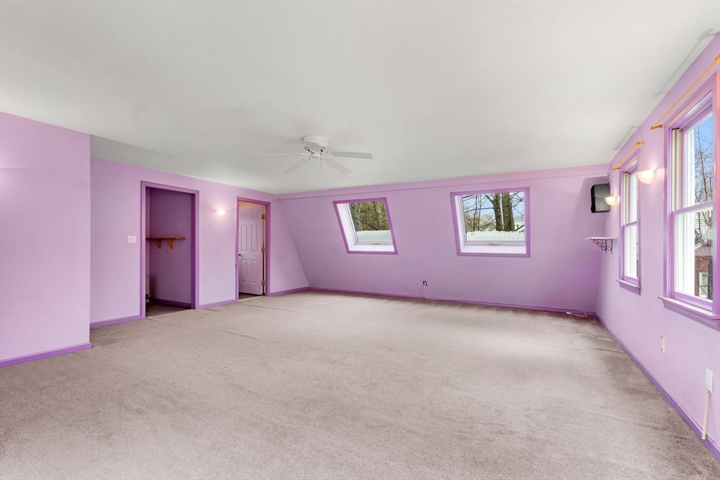 104 Mill Street Groton, MA 01450 - Photo 25 of 30 an empty room with windows