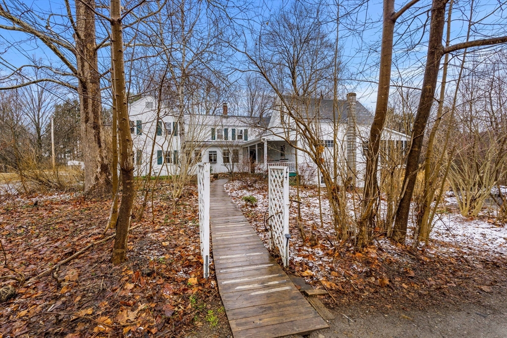 104 Mill Street Groton, MA 01450 - Photo 3 of 30 a pathway with a yard
