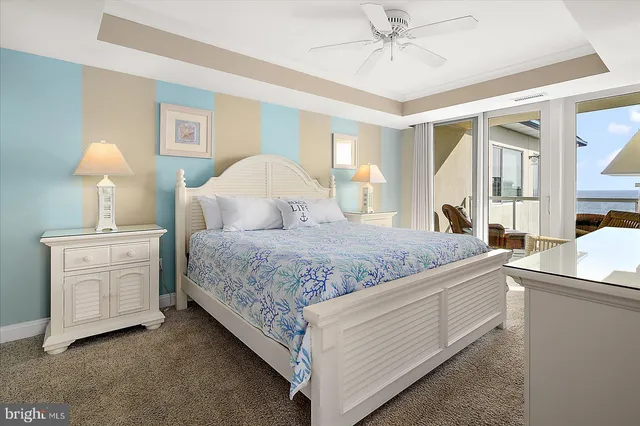 a large bathroom with a double vanity sink a large mirror and shower