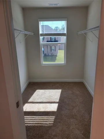 a utility room with window washer and dryer